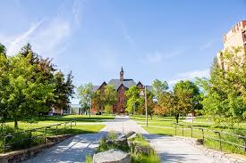 Montana Hall from afar on a sunny day