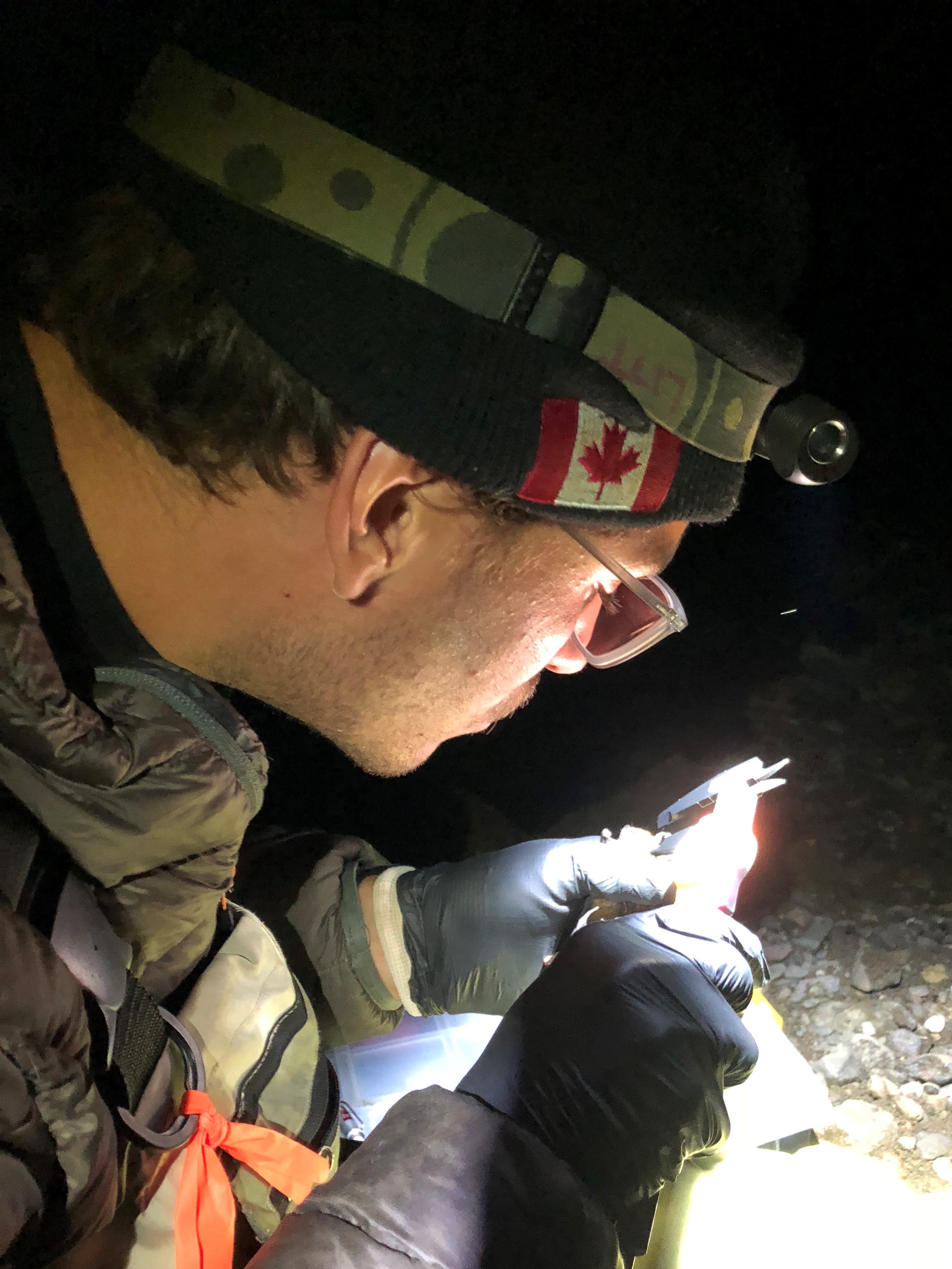 Jacob measuring a bat.