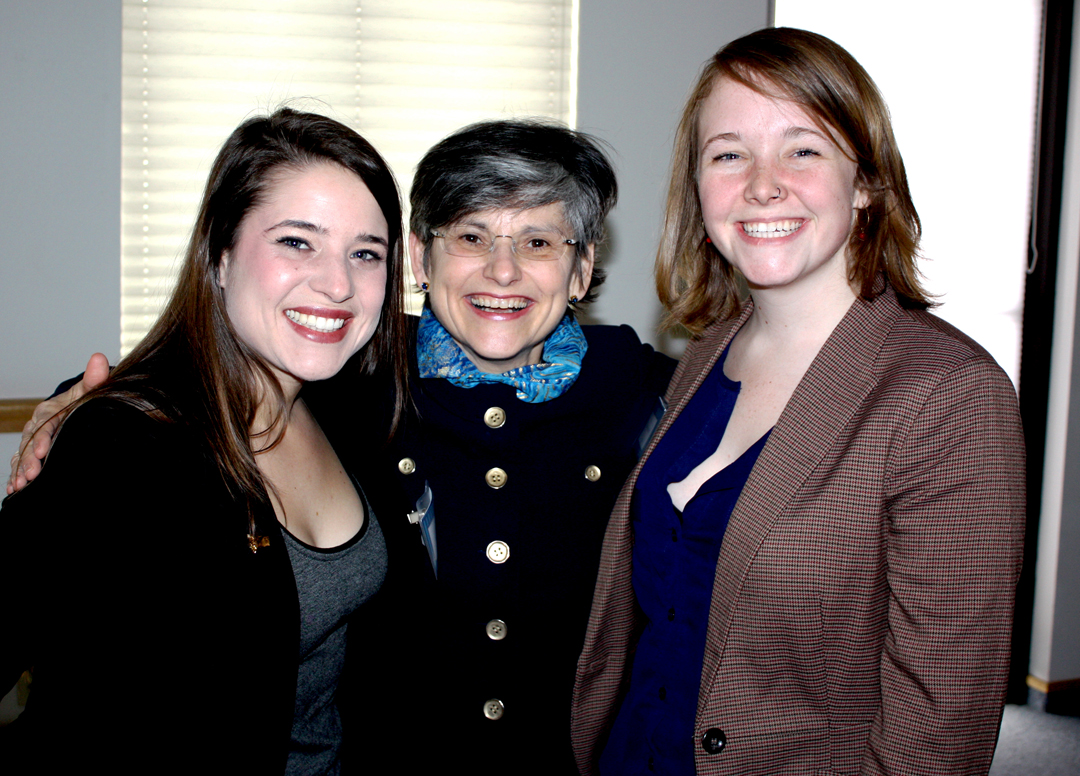 President Cruzado with two student award winners 